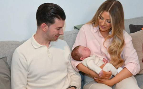 Grace Bell and Steven Powell with their baby son Hugo