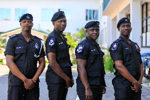 A photo of 4 police officers