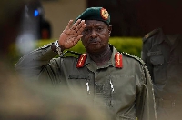 President Yoweri Museveni salutes the army during the celebrations