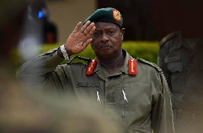 President Yoweri Museveni salutes the army during the celebrations