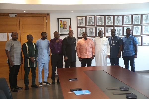 Minister of Communications Samuel George with officials and management of Afriwave