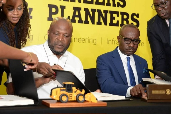 CEO of Engineers & Planners, Ibrahim Mahama (in white) at the signing ceremony with EBID