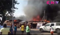 The fire spread to other shops, as residents tried various means to put it out