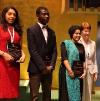 Gideon, second from left in a pose with other award winners.
