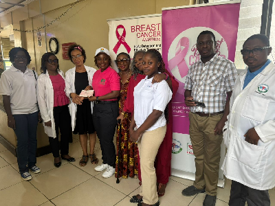 Lady Captain of Achimota Golf Club, Kous Louanges Mang presented the cheque to Dr Dedey