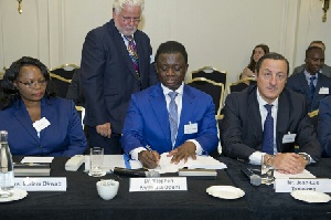Dr Stephen Opuni Signing Documents
