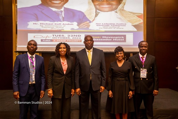 Justice Amadu Tanko (Middle) with other dignitaries at the workshop