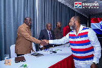 Dr Mahamudu Bawumia and NAPO exchanging pleasantries