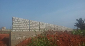 Fence wall being erected to claim a portion of the Ramsar site.