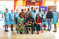 Some Wesley Grammar students in a photo with Dr. Edwin Provencal and others