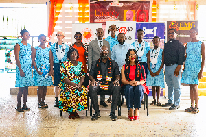 Some Wesley Grammar students in a photo with Dr. Edwin Provencal and others