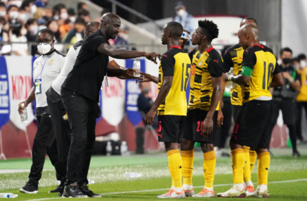 Black Stars head coach, Otto Addo address his players at the touchline
