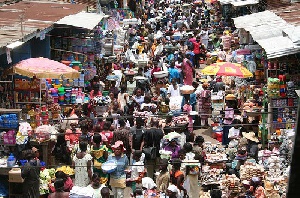 Several traders at the Kumasi market in the Ashanti region