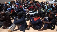 A picture of some Migrants in Libya who were being sold into slavery