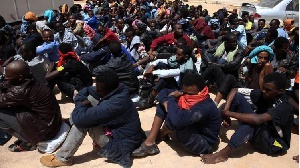 A picture of some Migrants in Libya who were being sold into slavery
