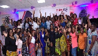 A group photo of AirtelTigo female employees and speakers