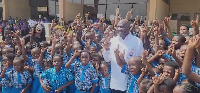 Dr Mahamudu Bawumia in a group photograph with the pupils