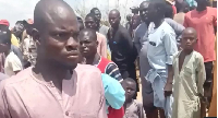 Crowds gathered at the bank of the river to watch the rescue mission