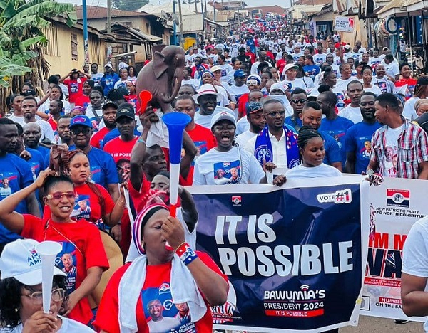 Evans Bobie Opoku with some NPP party members during the walk at Mim