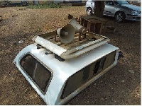 The steel canopy cover and siren speaker detached from the stolen NHIA vehicle