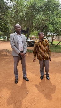 The MP for Bosome Freho (left)  at a BECE centre