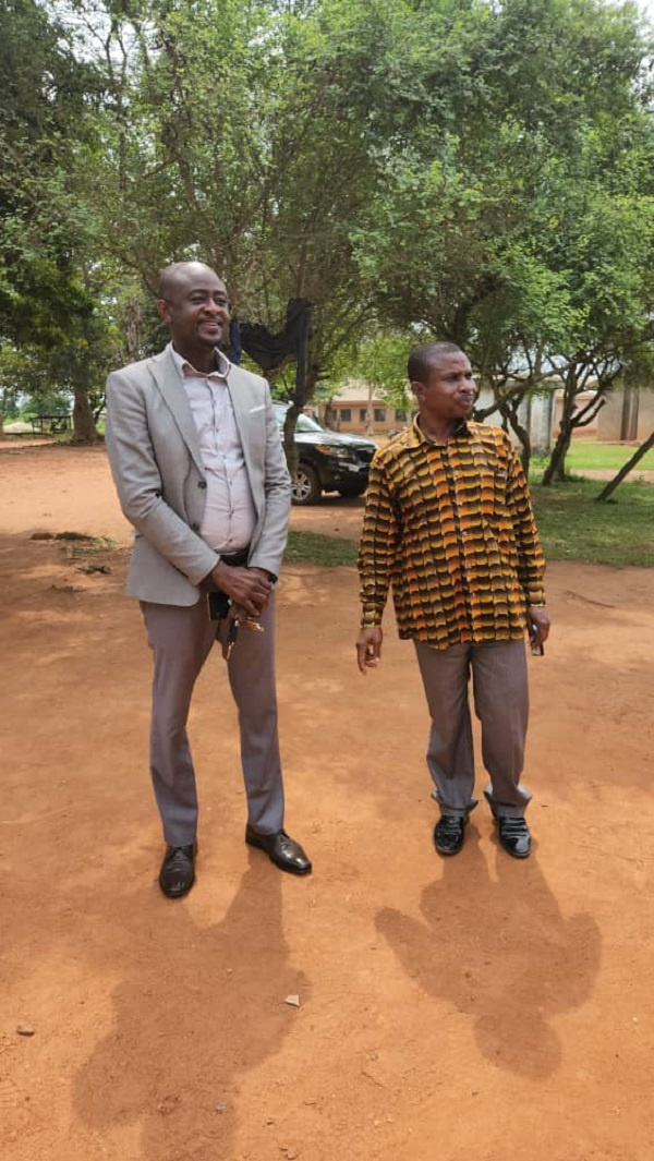 The MP for Bosome Freho (left)  at a BECE centre