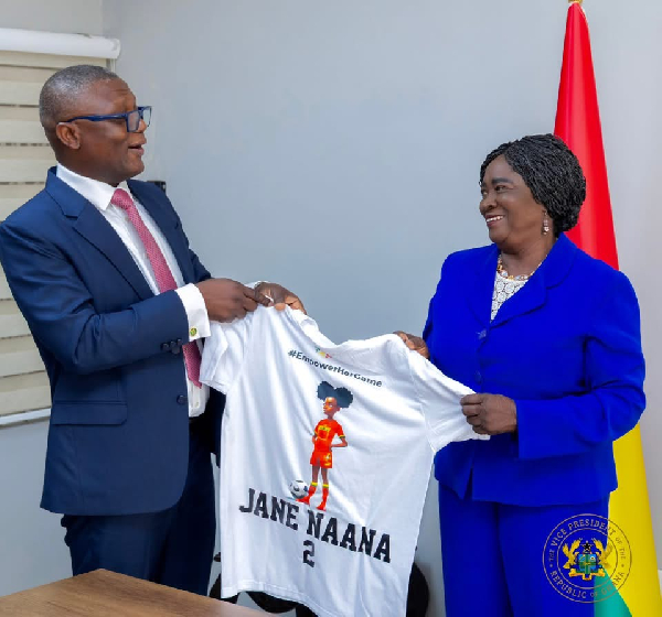 Kofi Adams (L) and the Vice President Professor Jane Naana Opoku-Agyemang (R) during the visit