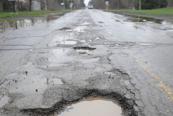 The road which was constructed in 2014 has become a death trap to residents