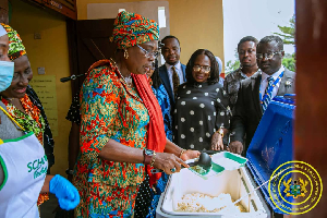 Zuwera Mohammed Ibrahimiah serving some of the students during her tour