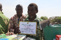 Visually impaired Aduni Achana, cultivates rice at Bonia in the Kasena-Nankana Municipal Assembly