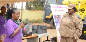 Vanice Mirembe (R) has urged Ugandans to embrace the use of clean energy