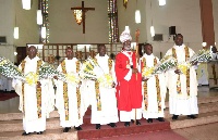 The newly-ordained priests in a group photograph with Most Reverend
