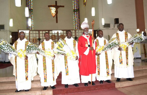 The newly-ordained priests in a group photograph with Most Reverend