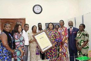 Dr. Doreen Owusu-Fianko presenting the citation to the First Lady