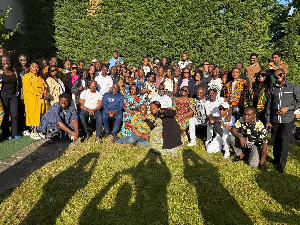 Dr Ayine and some officials in a group picture with the Ghanaian community in Vienna