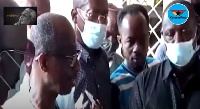 NDC's General Secretary, Johnson Asiedu Nketia with some party officials at the hospital