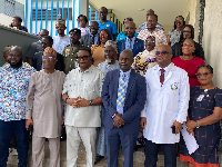 A picture of Elvis Afryie Ankrah and some staff of Korle Bu Teaching Hospital