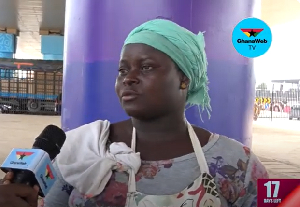 A street hawker speaking on how the traffic flow has affected her business