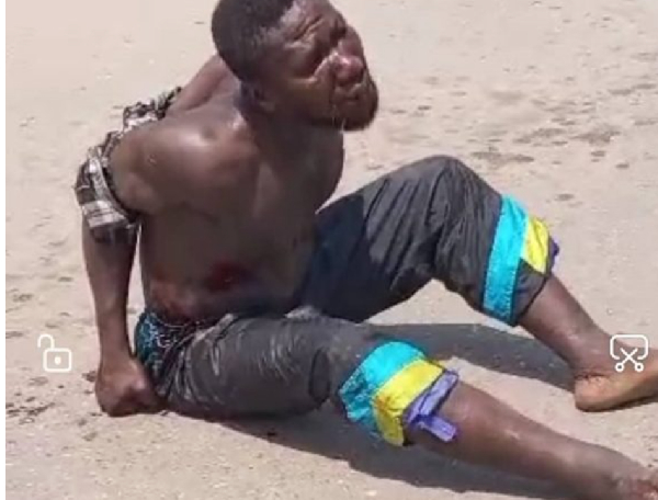 The thief is seen beaten mercilessly