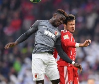 Daniel Opare stops a player from scoring a goal, wins a free kick