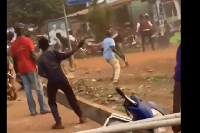 Some members of NPP and NDC pelting stones at each other