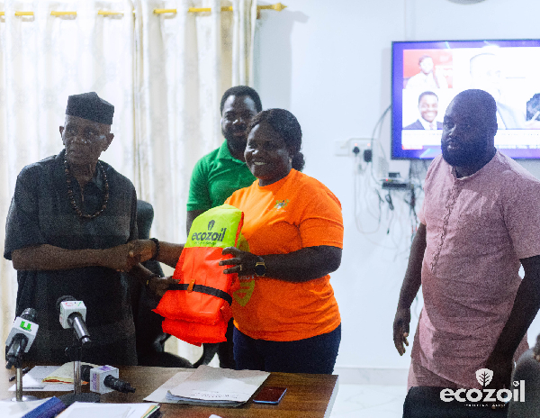 The Oti Regional Minister (L) with the Volta Lake Transport Safety Project National Coordinator