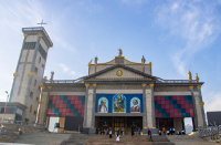 People seen at the St Joseph Metropolitan Cathedral ahead of Pope Leo XIV's visit in Bamenda