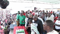 Former Presidents Rawlings and Mahama and other NDC bigwigs cutting the cake for the anniversary
