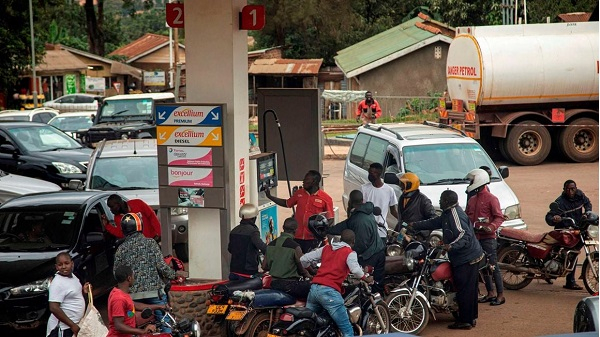 Motorists at a petrol station in Kampala, Uganda