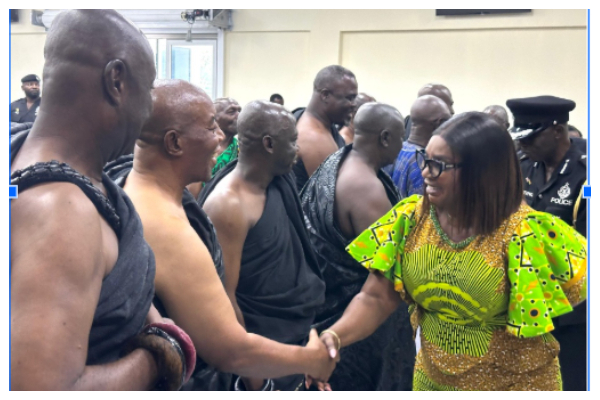 Rita Awatey in handshake with Akyemfour Asiedu Agyemang III