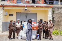Claudia Lumor Kwarteng with some officers during the donation