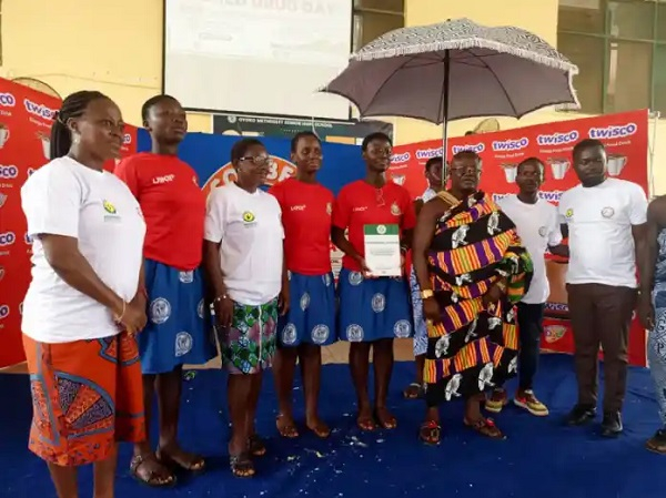 Participants of the debate in a group picture with some dignitaries who attended the event