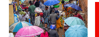 Residents shop at an open-air market on the outskirts of Kigali, Rwanda.
