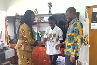 Darko Benjamin meets KNUST VC (left) with another official
